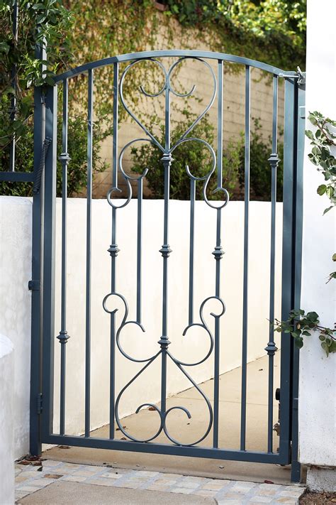 house gate metal fantasy|decorative wrought iron gate designs.